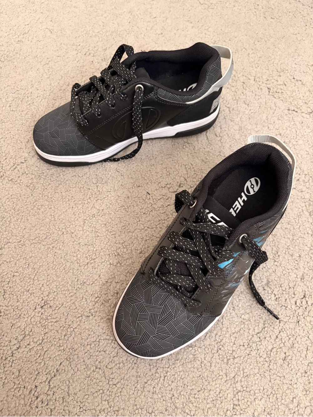 Heelys Black and White Kids' Sneakers with Subtle Blue Accent